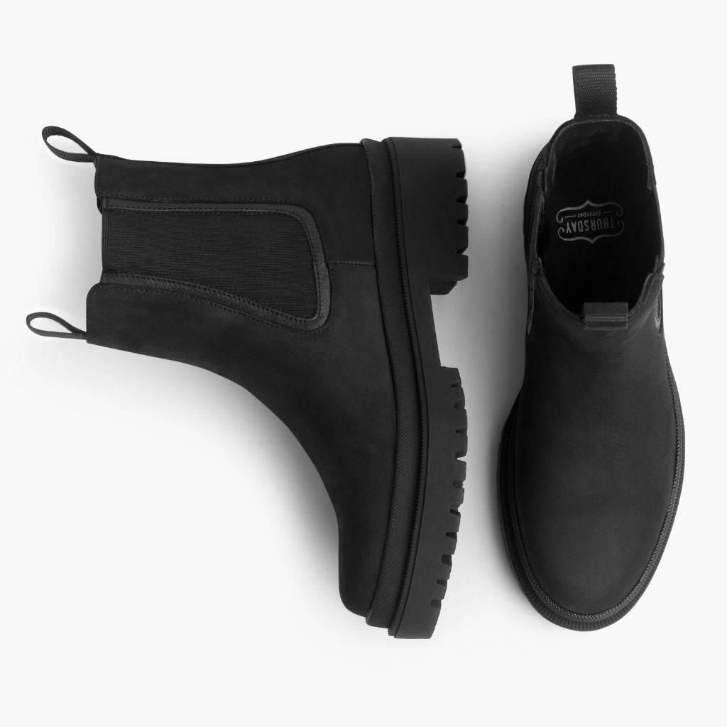 High-Traction Rubber Outsole & Lug Tread Pattern on Legend Platform Negro Mate Botas de cuero para Mujer