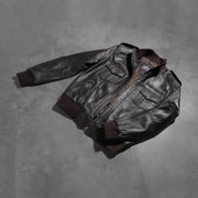 Styled Fit Perspective of Men's Agent Shadow Marrón Cazadora Bomber de Cuero para Hombre on Model - Natural Daylight Drape