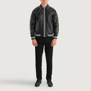 Cooper Black Leather Varsity Jacket - Vista de perfil lateral con corte ergonómico de manga
