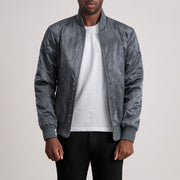 Danson Acolchado Gris Varsity Chaqueta de Cuero para Hombre - Vista de perfil lateral con corte ergonómico de manga