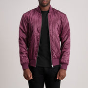 Danson Acolchado Granate Varsity Chaqueta de Cuero para Hombre - Vista de perfil lateral con corte ergonómico de manga