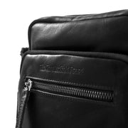 
Solid Antique Brass Hardware & Heavy-Duty Dual Zipper Detail on Birmingham Bandolera de cuero flor