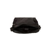 
Solid Antique Brass Hardware & Heavy-Duty Dual Zipper Detail on Raphael Bandolera de cuero flor