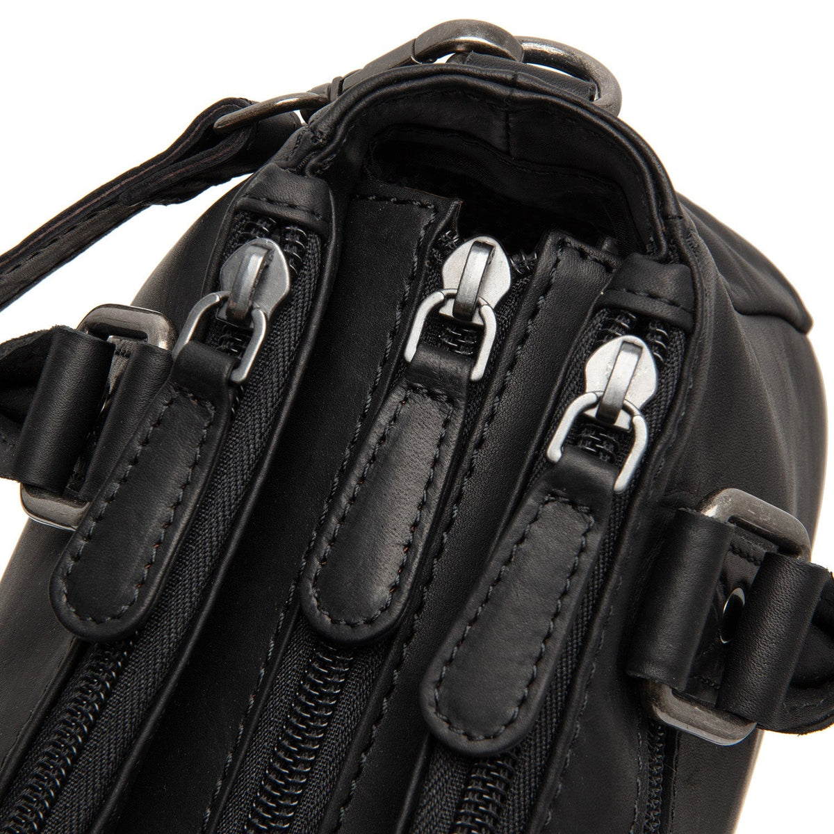 
Fenja Bolso de mano de cuero flor - Vista lateral mostrando el corte ergonómico de mangas