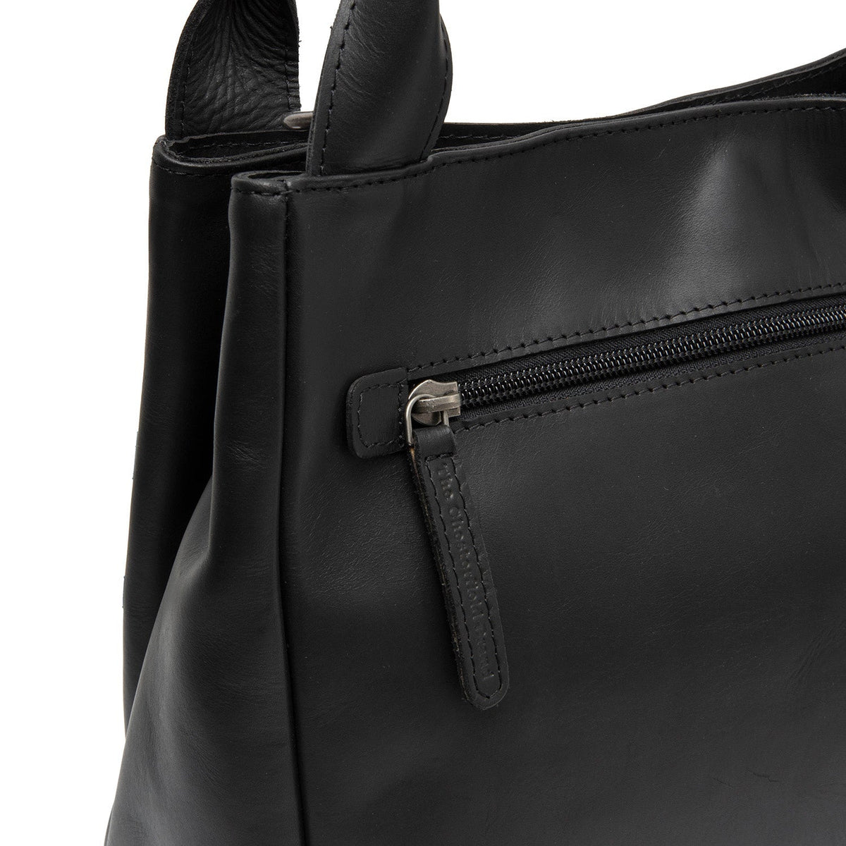 
Vista de detalle of Classic Collar & Heavy-Duty Zipper Hardware on Tenara Bolso de mano de cuero flor