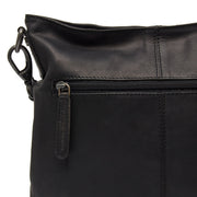 
Solid Antique Brass Hardware & Heavy-Duty Dual Zipper Detail on Jen Bolso de hombro de cuero flor