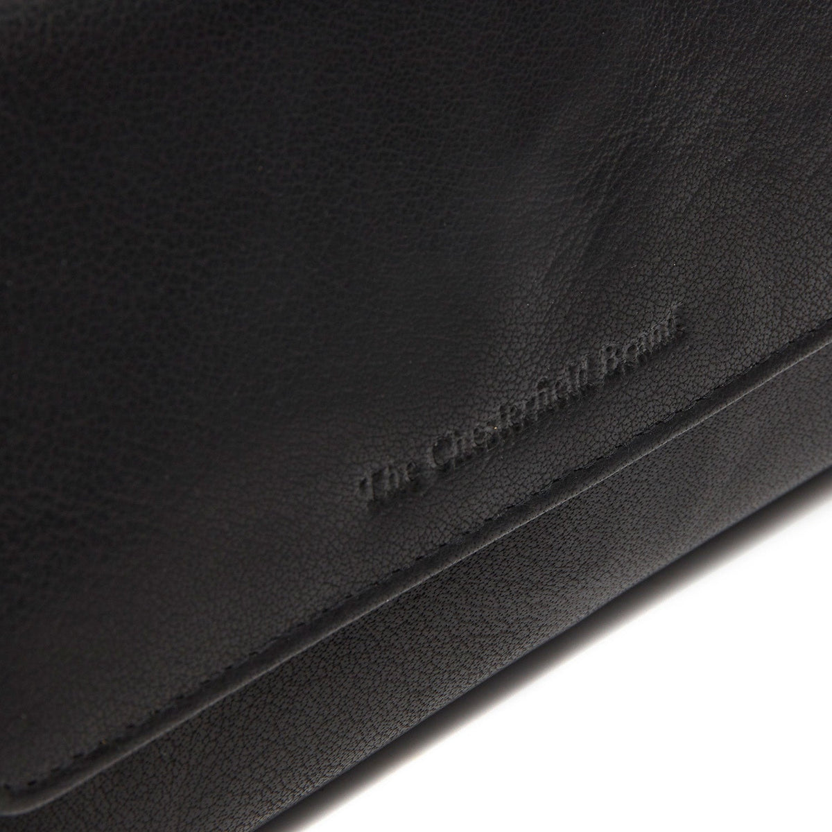 
Solid Antique Brass Hardware & Heavy-Duty Dual Zipper Detail on Rhodos Billetera de cuero flor