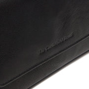 
Solid Antique Brass Hardware & Heavy-Duty Dual Zipper Detail on Rhodos Billetera de cuero flor