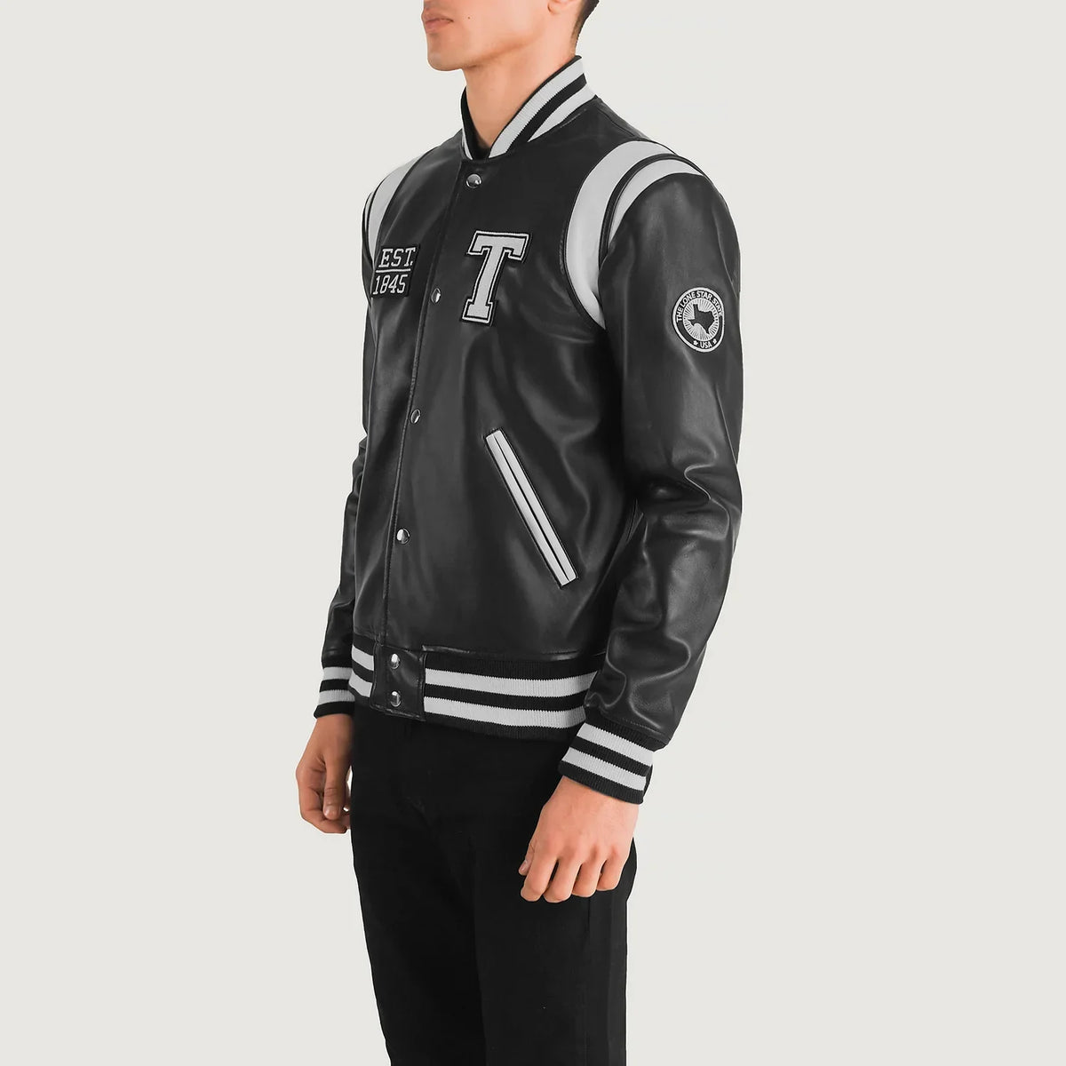 Black &amp; White Sheepskin Leather Varsity Jacket - Vista trasera con ajuste entallado en hombros y bajo impecable