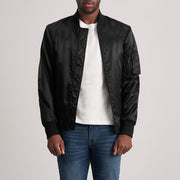 Quinton MA-1 Negro Cazadora Bomber de Cuero para Hombre - Vista de perfil lateral con corte ergonómico de manga