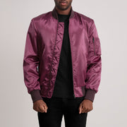 Quinton MA-1 Granate Cazadora Bomber de Cuero para Hombre - Vista de perfil lateral con corte ergonómico de manga