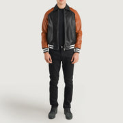 Walton Blue Leather Varsity Jacket - Vista de perfil lateral con corte ergonómico de manga